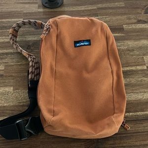 KAVU ONE STRAP Bag in a brownish orange color.